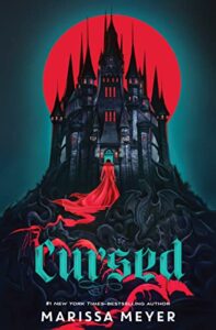 Cursed by Marissa Meyer cover shows a dark castle in front of a full red moon. A person cloaked in red stands facing the castle.