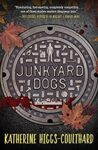 Junkyard Dogs by Katherine Higgs-Coulthard cover shows a sewer cover with the title on it and small symbols around it - a basketball, hammer, house, and person.