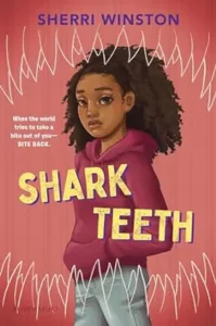 Shark Teeth by Sherri Winston cover shows a girl with curly hair wearing jeans and a hoodie with her hands in her pockets. A line drawing of upper and lower rows of shark's teeth is superimposed over the image.